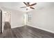 Bedroom with new floors, ceiling fan and neutral colors offers a calm atmosphere at 5700 Tracy Dr, Mableton, GA 30126