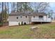 Back exterior of home features a deck and siding at 5700 Tracy Dr, Mableton, GA 30126