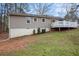Back exterior of home features a deck and siding at 5700 Tracy Dr, Mableton, GA 30126