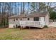 Back exterior of home features a deck and siding at 5700 Tracy Dr, Mableton, GA 30126