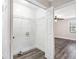 Bright laundry room with washer hookups and wire shelving for storage at 5700 Tracy Dr, Mableton, GA 30126