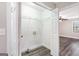 Bright laundry room featuring modern light gray wood floors at 5700 Tracy Dr, Mableton, GA 30126