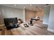 This basement features wood flooring and a drop ceiling at 1504 Kimberly Pl, Canton, GA 30114
