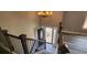 This foyer features wood flooring and a staircase with wood and iron railing at 1504 Kimberly Pl, Canton, GA 30114