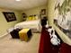 A charming bedroom features a comfortable queen-size bed, soft carpet, and ample natural light at 2514 Green Forest Ct, Snellville, GA 30078