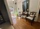Traditional foyer with hardwood floors, decorative chairs, and an entryway leading to the front porch at 2514 Green Forest Ct, Snellville, GA 30078