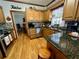Traditional kitchen with stainless appliances, and hardwood floors and breakfast nook at 2514 Green Forest Ct, Snellville, GA 30078