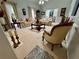 Bright living room with neutral carpet and ample seating and natural light at 2514 Green Forest Ct, Snellville, GA 30078
