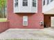 Brick home featuring a back patio, offering an outdoor space for relaxation and entertaining at 270 Morrow Rd, Newborn, GA 30056