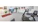 Finished basement with recreational equipment, neutral walls, and ample space for exercise and activities at 270 Morrow Rd, Newborn, GA 30056