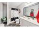 The bathroom features a shower and bath tub and a marble countertop sink with sleek faucet on a tile floor at 270 Morrow Rd, Newborn, GA 30056