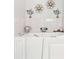 Relax in the walk in bathtub with a sleek chrome faucet and peaceful decorations at 270 Morrow Rd, Newborn, GA 30056