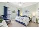 Inviting bedroom with plush carpet, soft blue accents, and a comfortable armchair at 270 Morrow Rd, Newborn, GA 30056