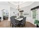 Charming dining room with tray ceilings, modern decor and hardwood flooring at 270 Morrow Rd, Newborn, GA 30056