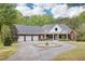 Lovely brick home with a circular driveway and a four car garage at 270 Morrow Rd, Newborn, GA 30056