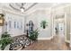 Elegant foyer with hardwood floors, decorative rug, and stylish decor at 270 Morrow Rd, Newborn, GA 30056