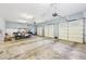 Spacious garage with multiple doors and room for parking, storage, and recreational vehicles at 270 Morrow Rd, Newborn, GA 30056