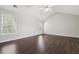 Large bedroom with vaulted ceilings and ample natural light, offering a relaxing retreat at 3380 Duncan Bridge Dr, Buford, GA 30519