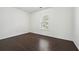 Cozy bedroom featuring hardwood floors and a bright window at 3380 Duncan Bridge Dr, Buford, GA 30519