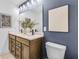 Modern bathroom showcasing double sinks, quartz countertops, and stylish fixtures at 5210 Birch Valley Rd, Cumming, GA 30028