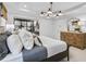 Bright and spacious main bedroom with a walk-through to the bathroom and a stylish dresser at 5210 Birch Valley Rd, Cumming, GA 30028