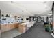 Resident amenity featuring tables, chairs and kitchen area and modern appliances in this communal room at 250 Pharr Ne Rd # 405, Atlanta, GA 30305