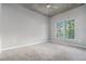 Bedroom with large window and neutral tones, a serene retreat at 250 Pharr Ne Rd, Atlanta, GA 30305