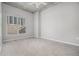 Cozy bedroom with a large window and grey carpet creating a bright and comfortable space at 250 Pharr Ne Rd, Atlanta, GA 30305