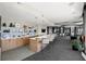 Stylish clubhouse with a long counter, seating and a fireplace, creating an inviting community space at 250 Pharr Ne Rd, Atlanta, GA 30305