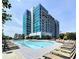 Luxurious outdoor swimming pool surrounded by lounge chairs, perfect for relaxation at 250 Pharr Ne Rd, Atlanta, GA 30305