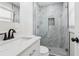 A modern bathroom features a glass-enclosed shower, sleek vanity, and upscale fixtures at 307 Gordon Woods Sw Dr, Mableton, GA 30126