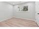 Neutral bedroom with wood floors, a window, and closet offer a comfortable space at 307 Gordon Woods Sw Dr, Mableton, GA 30126