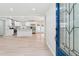 A bright, open-concept living area features a modern kitchen and a stylish front door at 307 Gordon Woods Sw Dr, Mableton, GA 30126