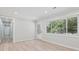 Bright room with lots of natural light featuring hardwood floors at 307 Gordon Woods Sw Dr, Mableton, GA 30126