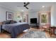 Bright bedroom with a ceiling fan, large windows, and tasteful decor at 3172 Chapel St, Scottdale, GA 30079