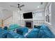 Cozy living room featuring a fireplace, built-in shelving, and comfortable seating at 3172 Chapel St, Scottdale, GA 30079