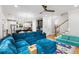 Open-concept living room showcasing fireplace, modern decor and kitchen at 3172 Chapel St, Scottdale, GA 30079