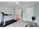 Home gym with exercise equipment and bright natural light filtering in at 3172 Chapel St, Scottdale, GA 30079