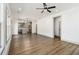 Bright, open living space with hardwood flooring, recessed lighting, and seamless access to the kitchen at 400 Stone Lea Trce, Oxford, GA 30054