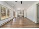 Spacious living room features wood floors and backyard view at 400 Stone Lea Trce, Oxford, GA 30054