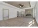Spacious main bedroom featuring a fireplace and plush carpet flooring at 400 Stone Lea Trce, Oxford, GA 30054