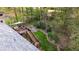 Aerial view of home with large deck, patio with firepit and lush backyard at 175 W Station Nw Dr, Kennesaw, GA 30144