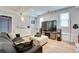 Spacious basement area featuring a comfortable seating area with a large television at 175 W Station Nw Dr, Kennesaw, GA 30144