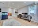 Versatile finished basement space with a home office setup and stylish decor at 175 W Station Nw Dr, Kennesaw, GA 30144