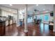 Finished basement area with bar, kitchenette, and dining table perfect for entertaining at 225 Ansley Close, Roswell, GA 30075