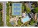 Aerial view of community amenities: tennis courts, playground, basketball court, pool and clubhouse at 225 Ansley Close, Roswell, GA 30075