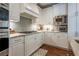 Bright kitchen with granite countertops, subway tile backsplash, and stainless steel appliances at 225 Ansley Close, Roswell, GA 30075