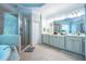 Bathroom featuring double vanity, soaking tub, walk-in shower, and a decorative window at 225 Ansley Close, Roswell, GA 30075