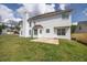 Large backyard showcasing the exterior of a two-story home, with an open lawn at 3019 Havenwood Way, Stonecrest, GA 30038