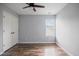 Bedroom features a ceiling fan, a window, hardwood floors and closet at 3019 Havenwood Way, Stonecrest, GA 30038